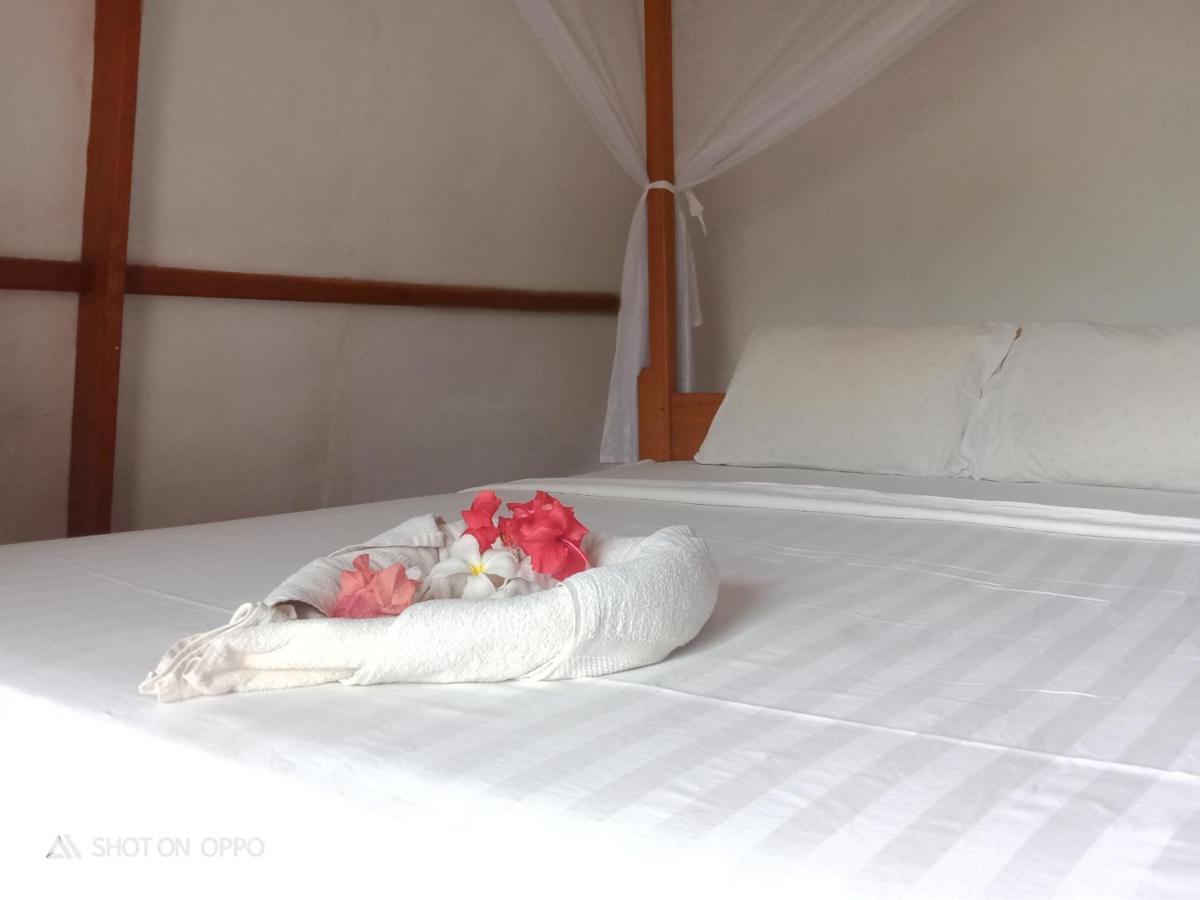 We'Be Cottages Gili Meno Exteriör bild